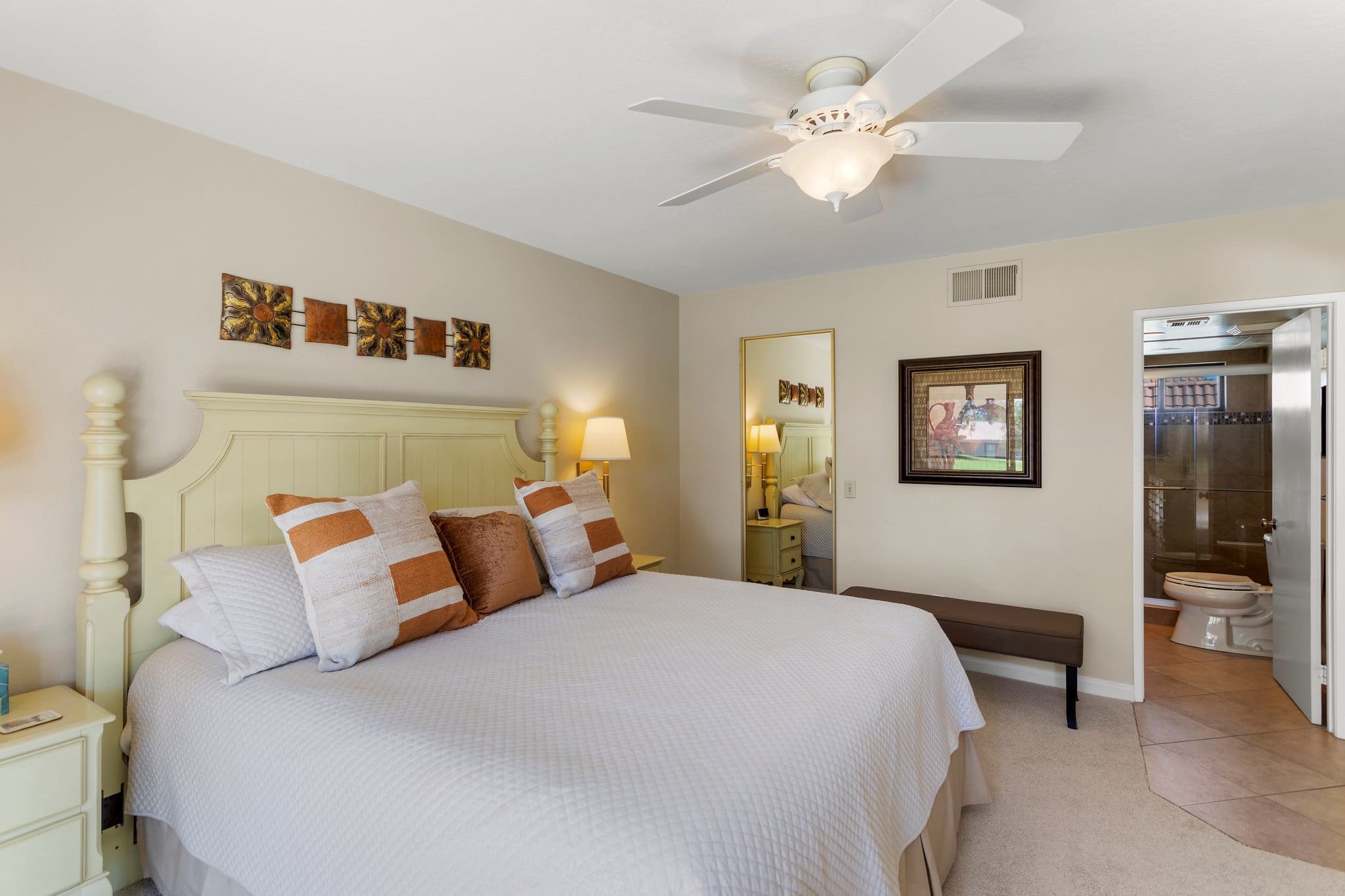 Master bedroom with king size bed overlooking bathroom at 40386 Pebble Beach