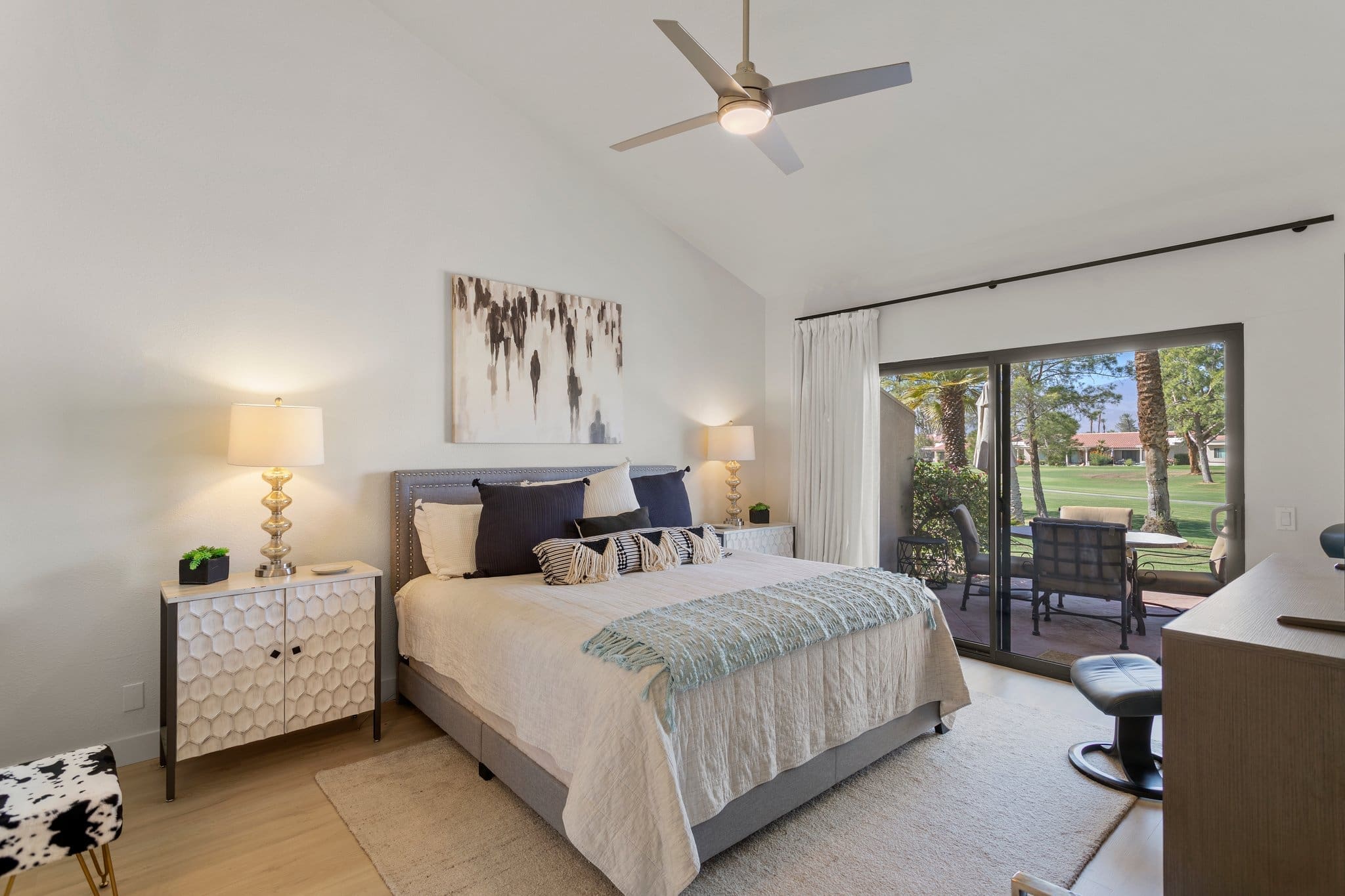 Master bedroom with view of sliding glass doors at 41443 Inverness Way