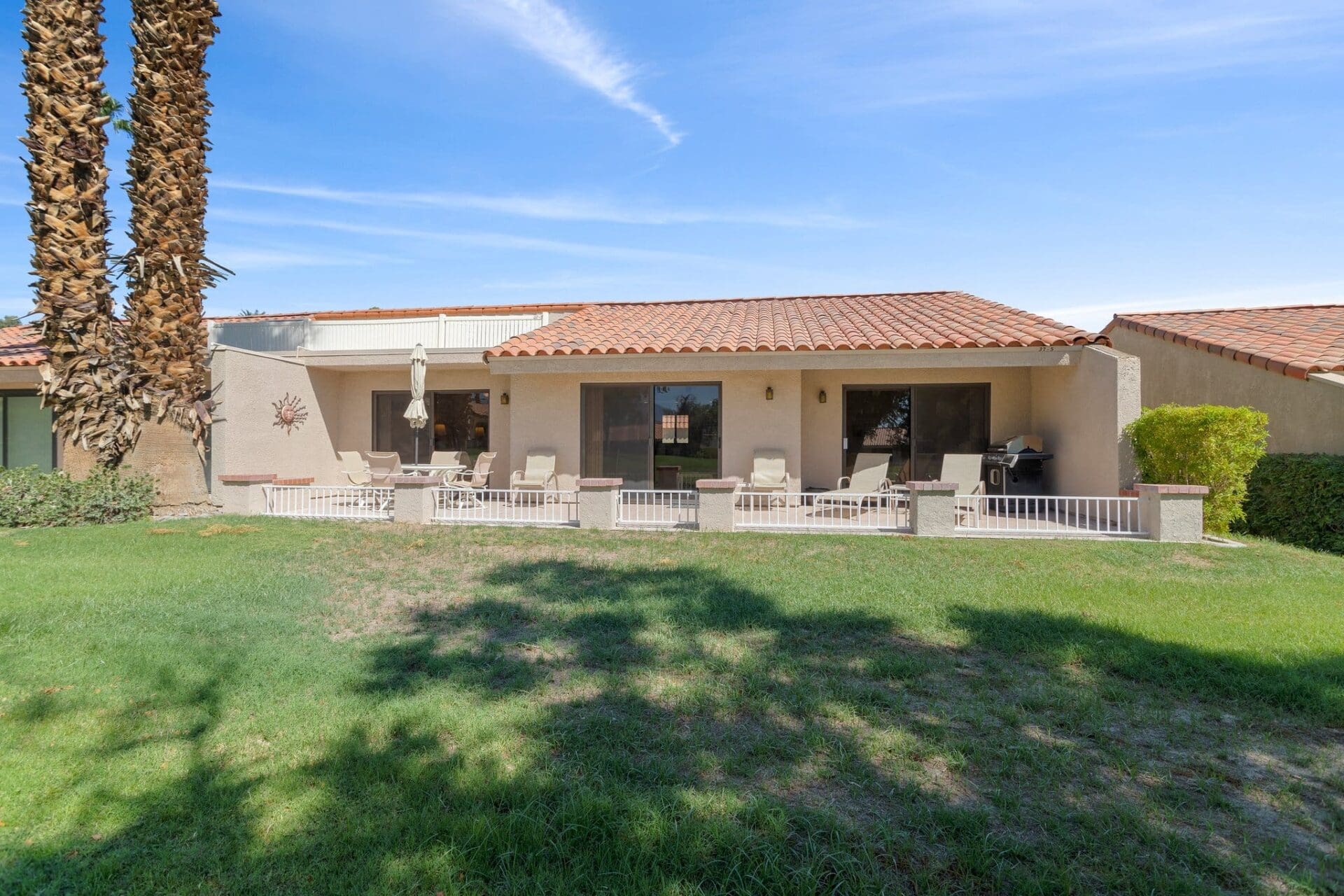Exterior rear patio and yard front view at 40386 Pebble Beach