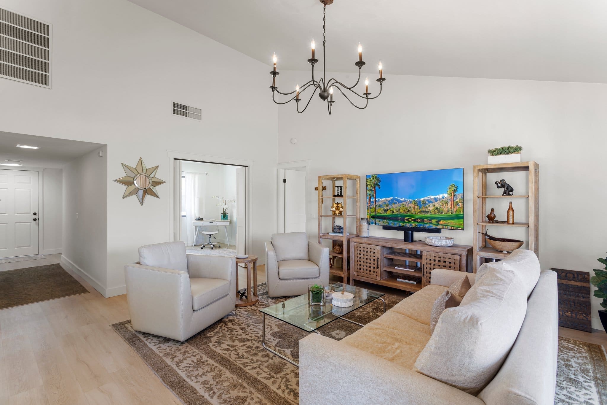 Living area displaying large flat screen tv at 41443 Inverness Way