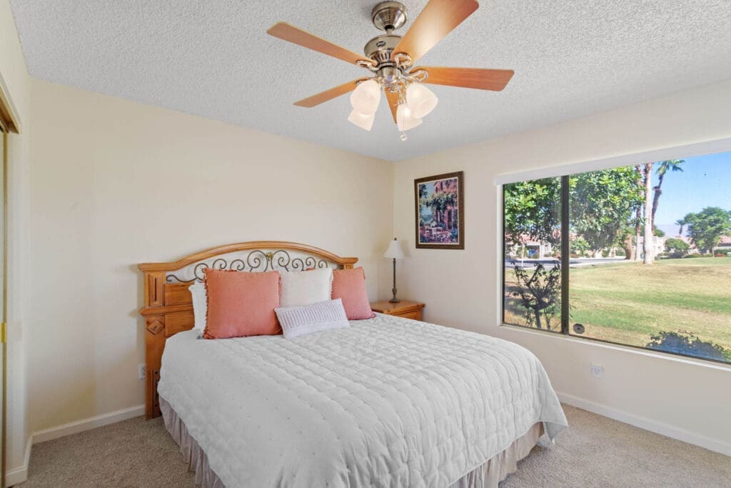Master bedroom with view out window at 77042 Pauma Valley Way