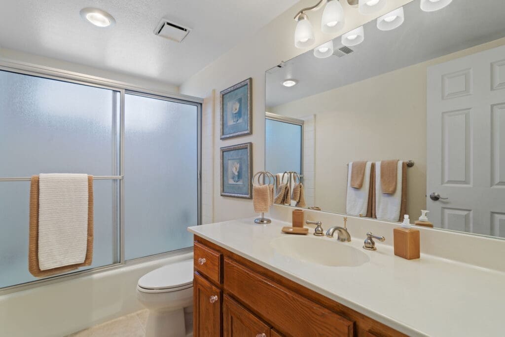 View of second bathroom and bathroom/shower and tub combo at 77042 Pauma Valley Way
