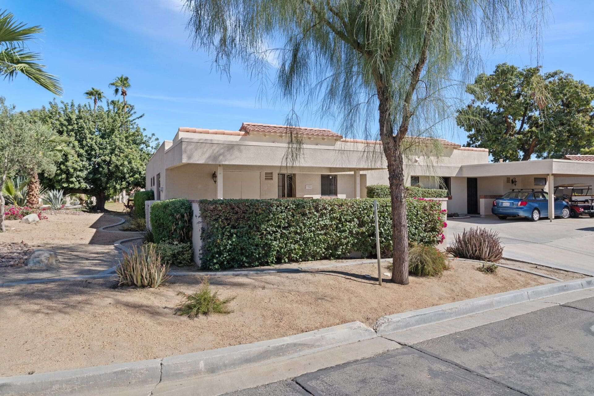 Front view of rental with carport at 77042 Pauma Valley Way
