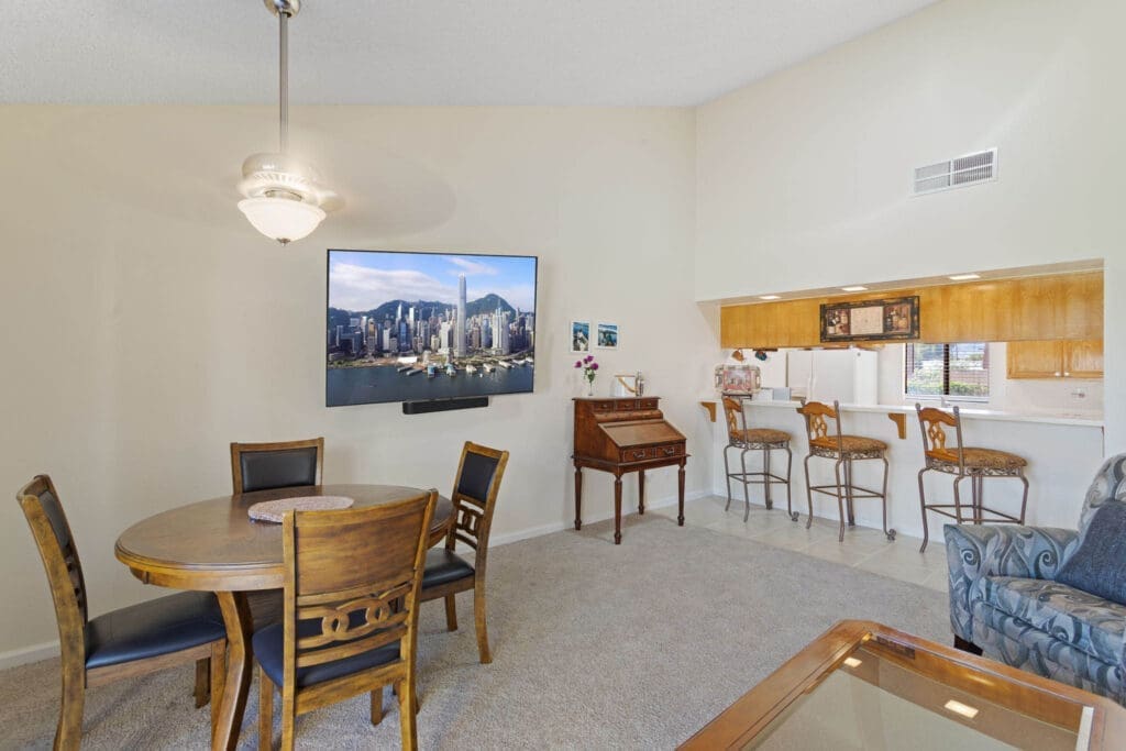 Dining area with large screen tv at 77042 Pauma Valley Way
