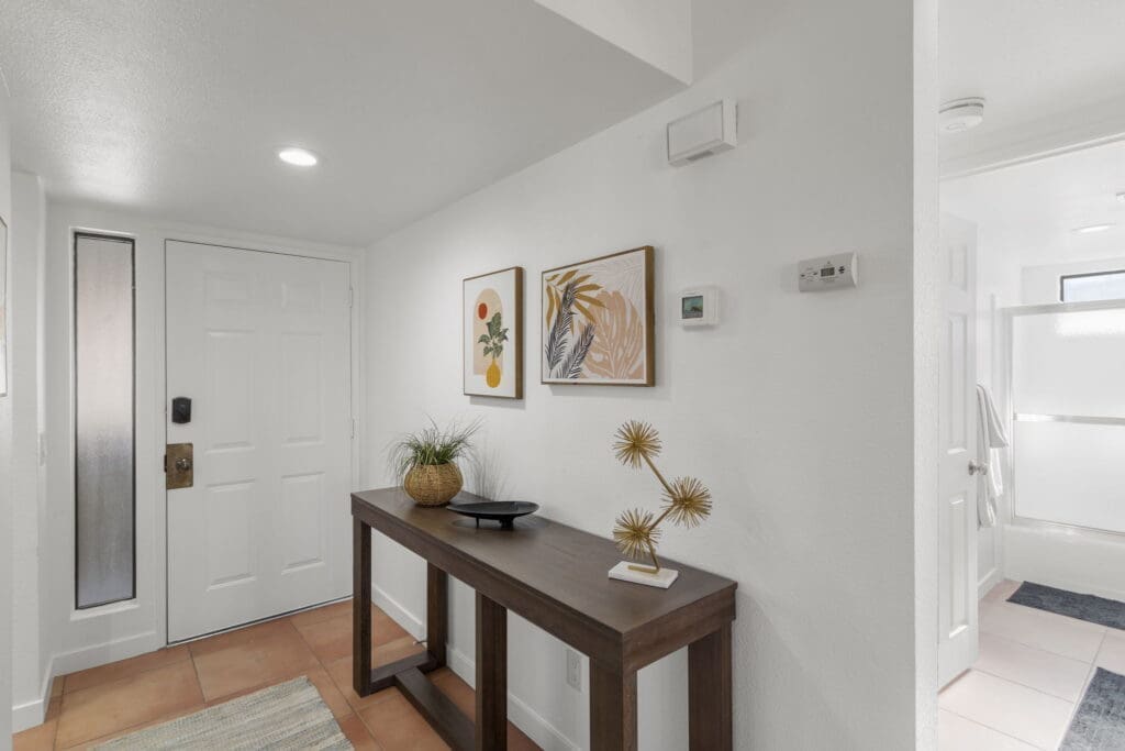 View of front door and bathroom at 41447 Inverness Way