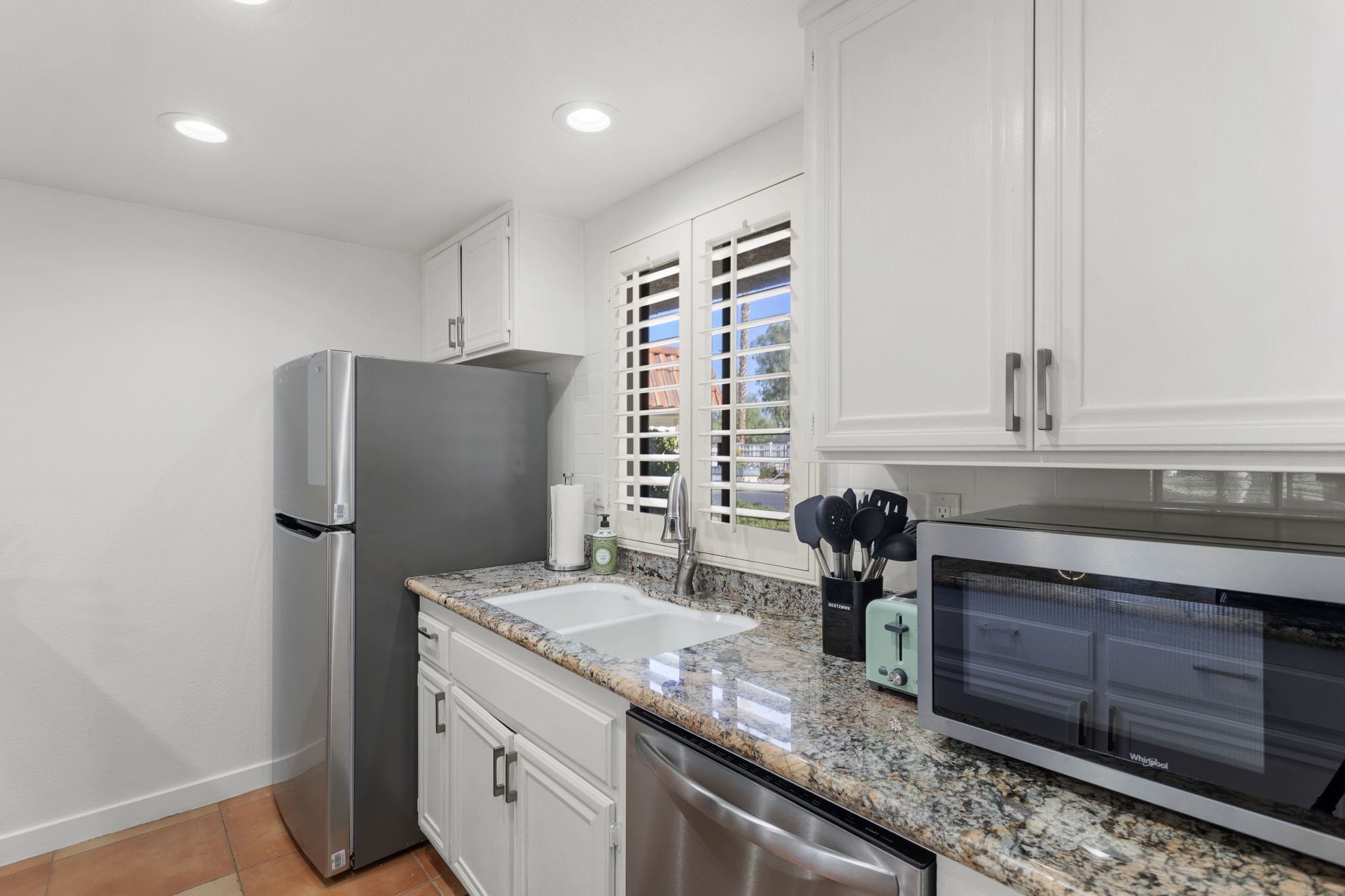 View of sink and refrigerator in kitchen at 41447 Inverness Way