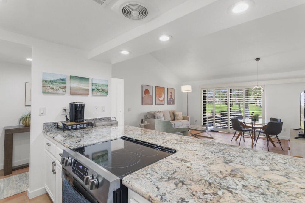 View of island and stove from kitchen at 41447 Inverness Way