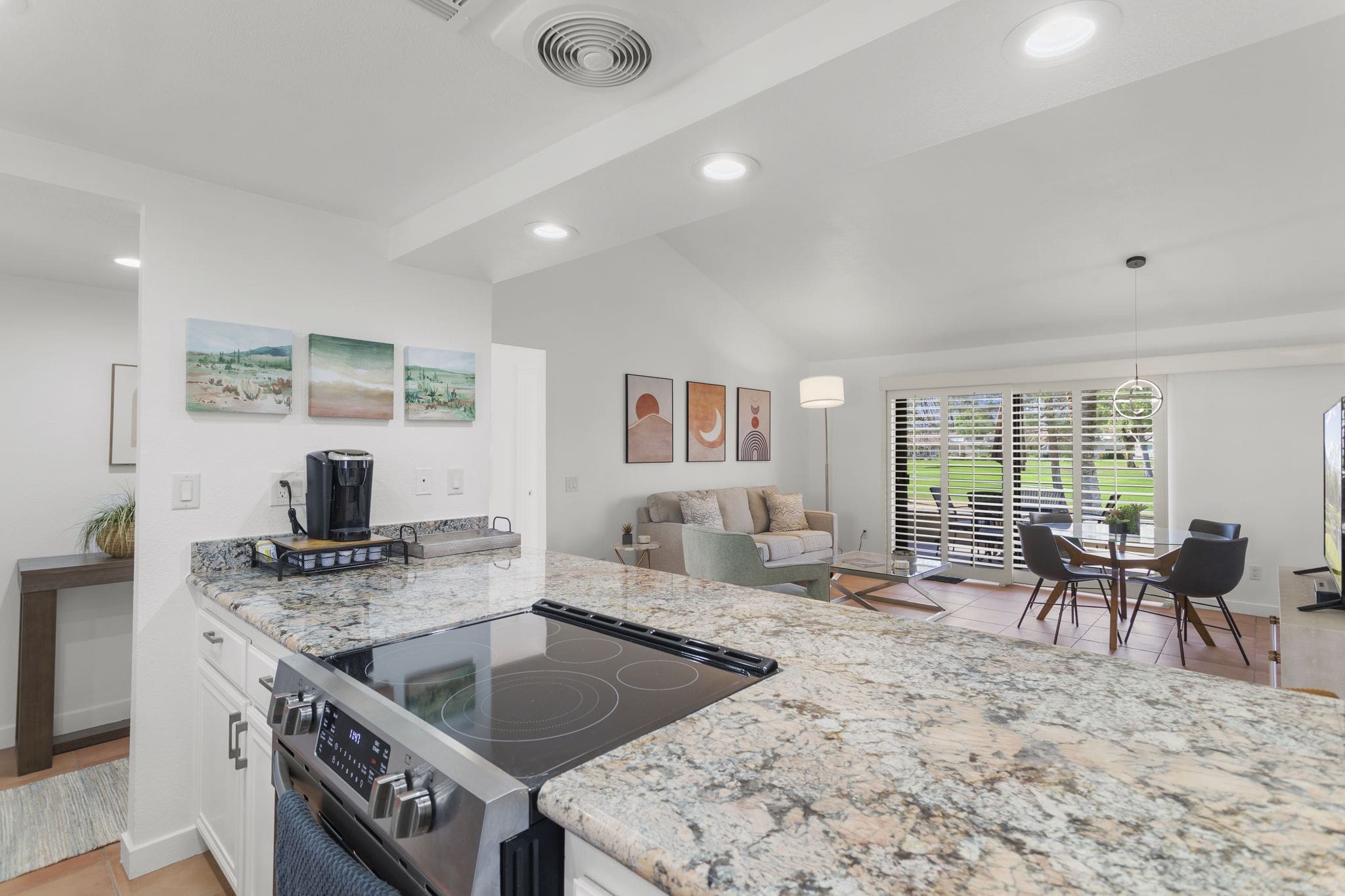 View of island and stove from kitchen at 41447 Inverness Way