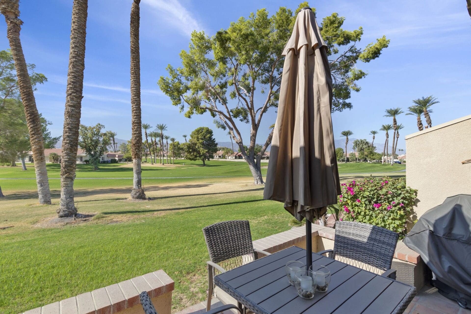 View from back patio overlooking Palm Desert at 41447 Inverness Way