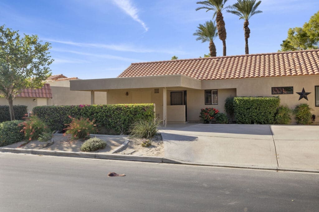 Front view of 41447 Inverness Way with carport