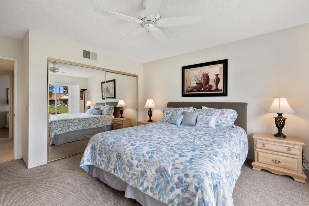 master bedroom with mirror sliding doors