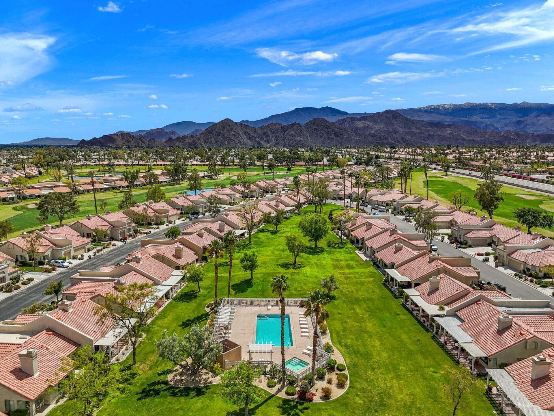 homes, pool and greenbelt at Palm Desert