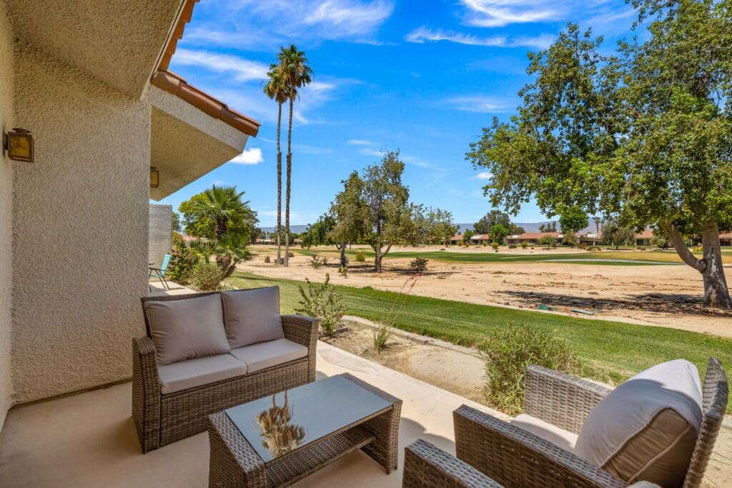 back patio seating overlooking golf course