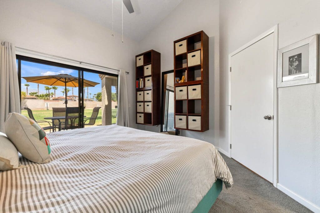 master bedroom with floating shelves