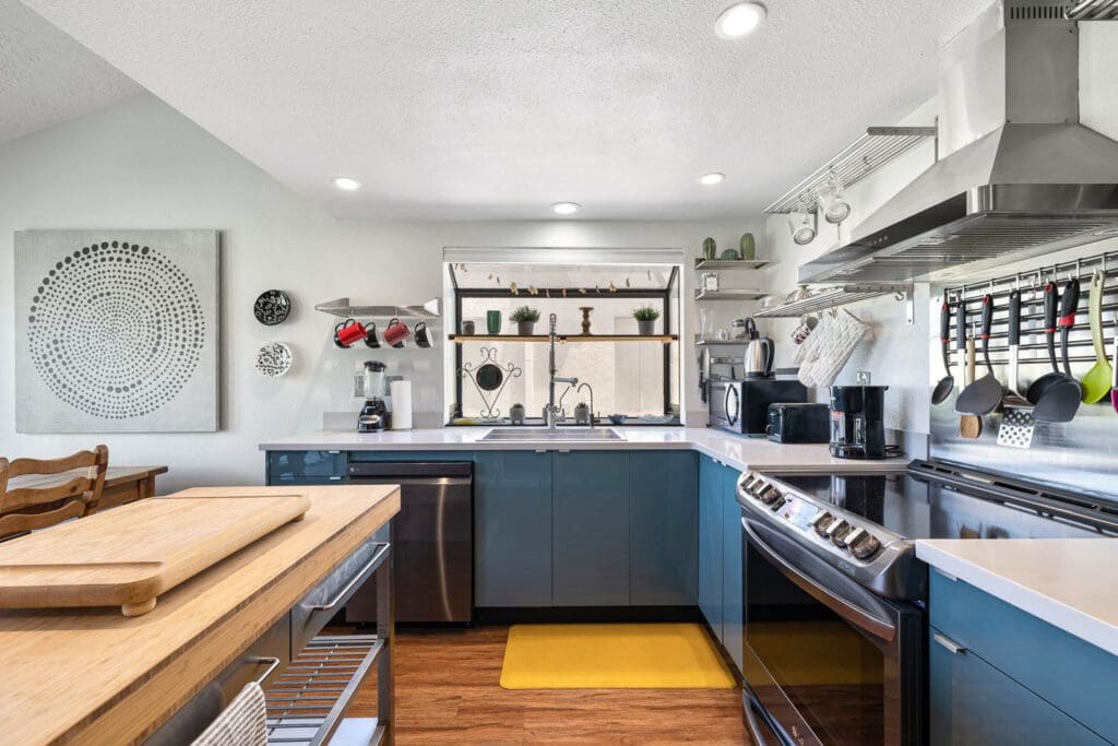 stove and island with teal accents