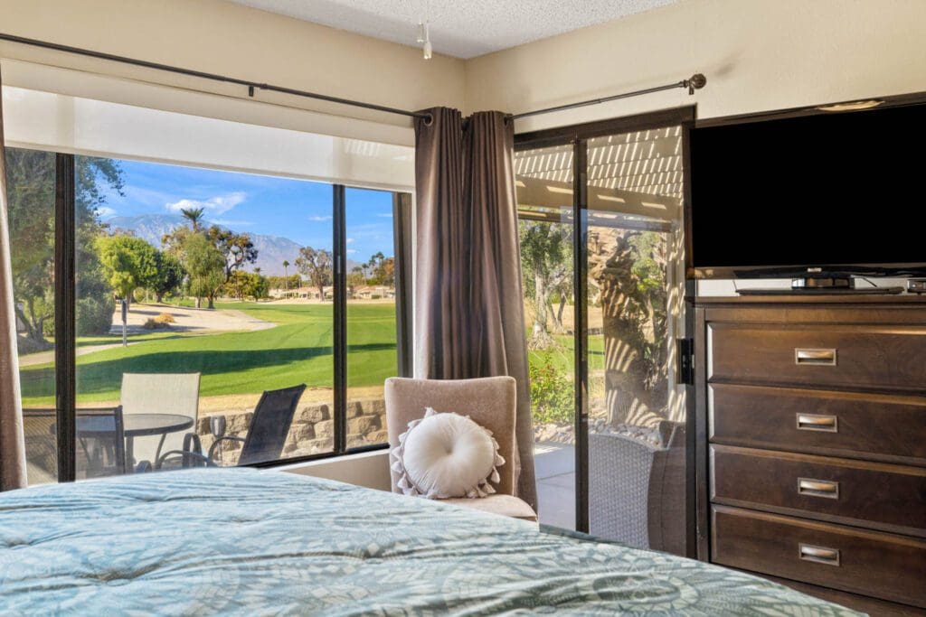 view of golf course from primary bed