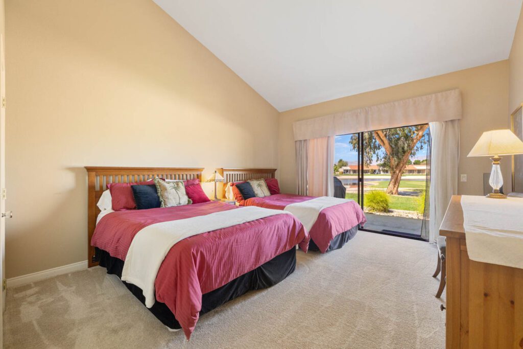 view of secondary bedroom and doors