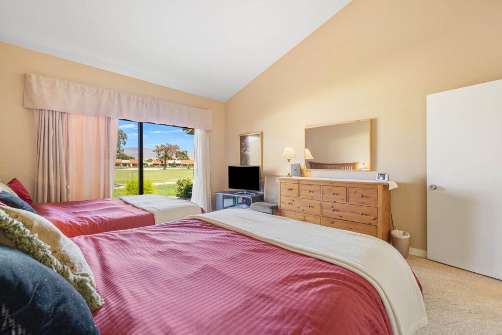 secondary bedroom slider door to gold course