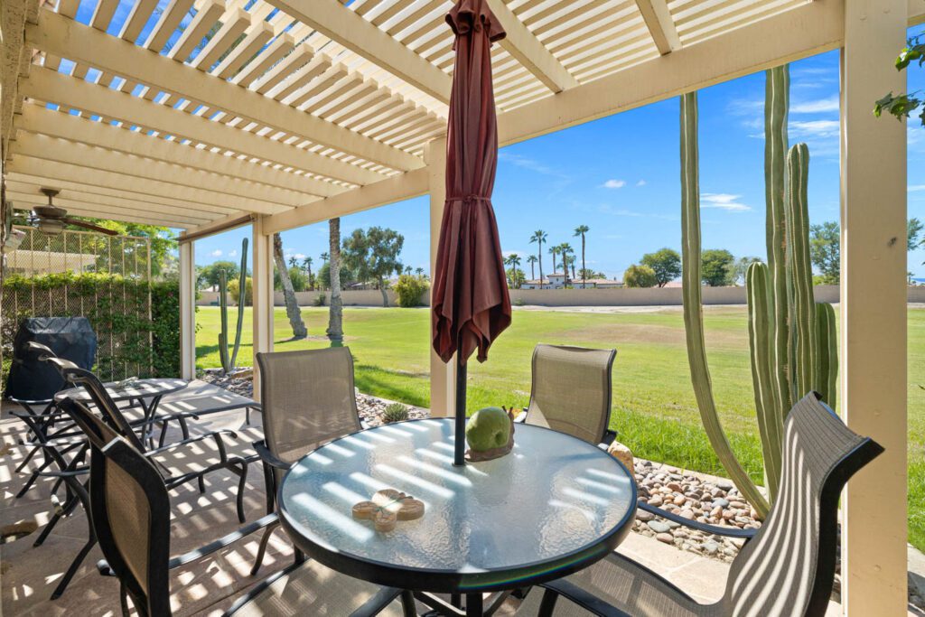 patio chairs and umbrella